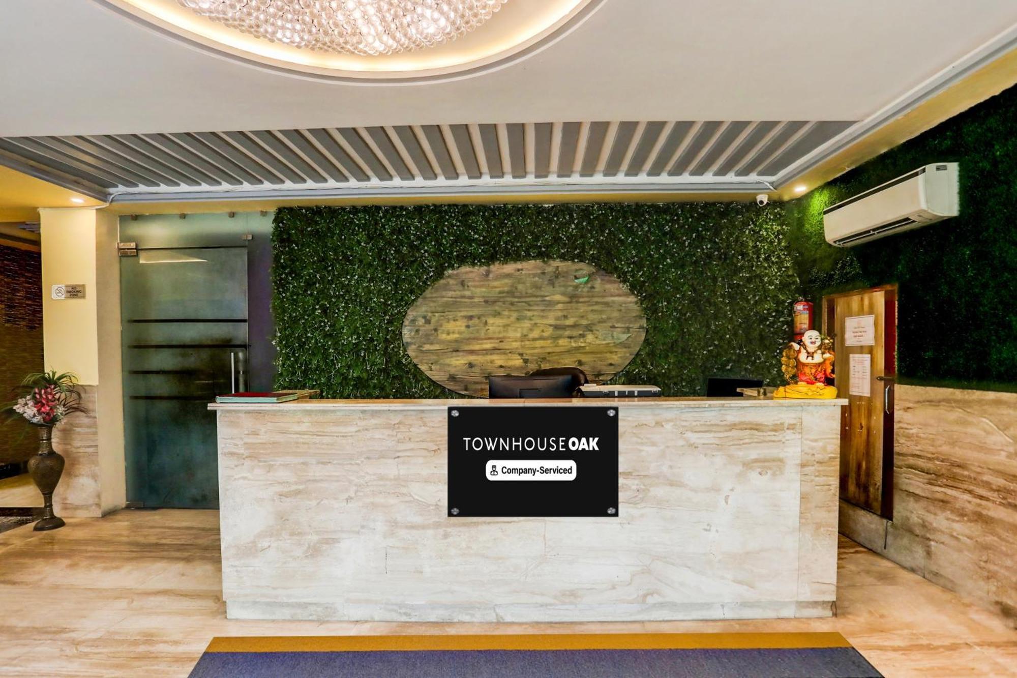 Super Townhouse Oak Pacify Hills Hotel Rajpur Bagian luar foto
